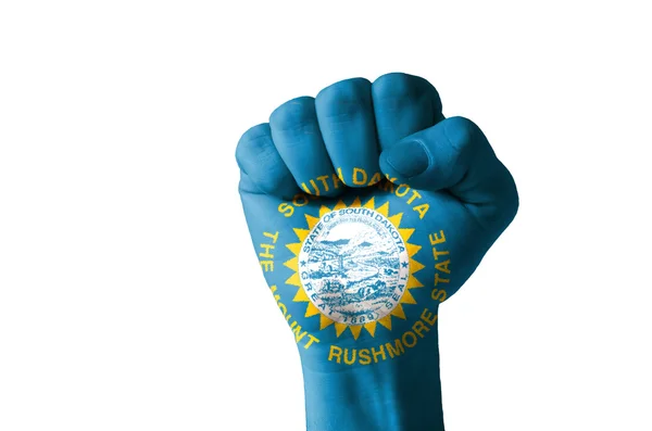 Кулак окрашен в цвета нашего штата Южный флаг Дакоты — стоковое фото