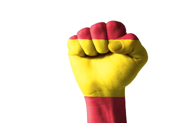 Кулак, окрашенный в цвета испанского флага — стоковое фото