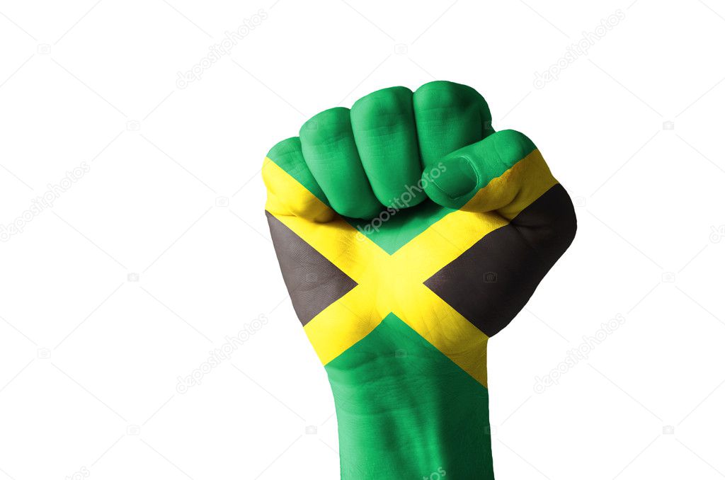 Fist painted in colors of jamaica flag