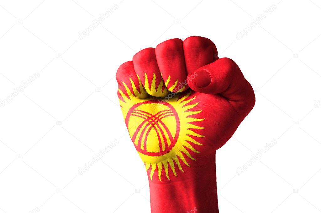 Fist painted in colors of kyrghyzstan flag