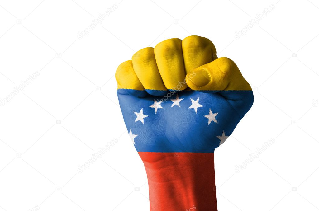 Fist painted in colors of venezuela flag