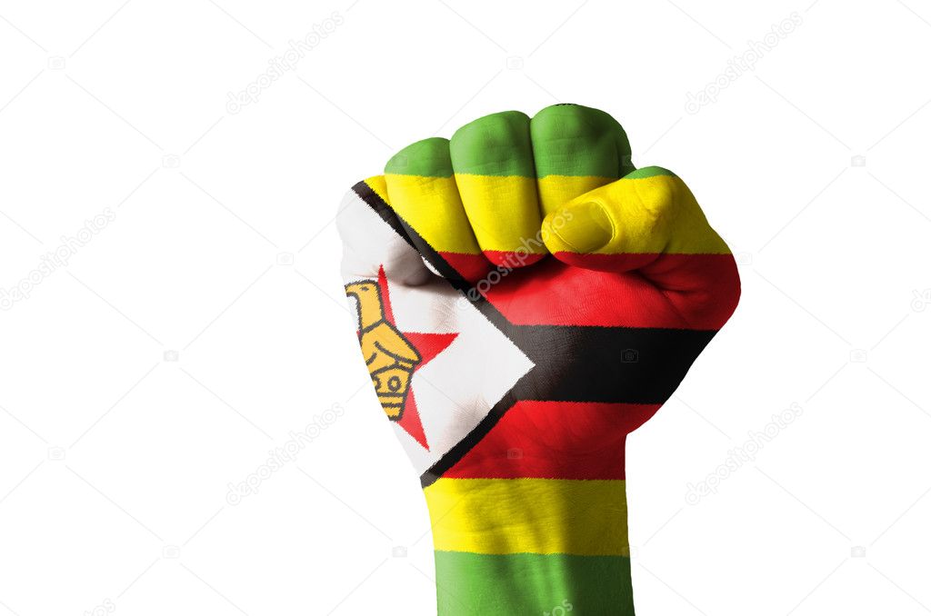 Fist painted in colors of zimbabwe flag