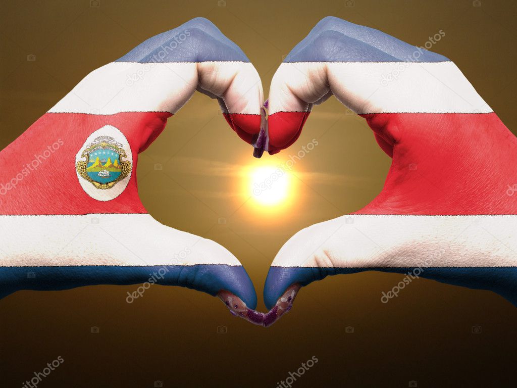 Heart and love gesture by hands colored in costa rica flag durin