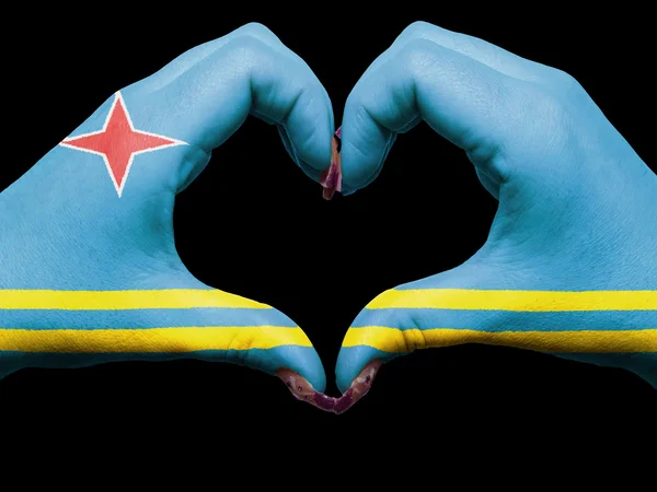 Heart and love gesture by hands colored in aruba flag for touris — Stock Photo, Image