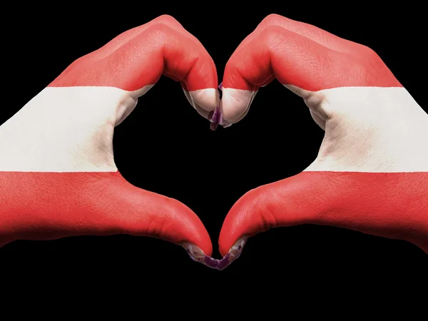 Coração e gesto de amor por mãos coloridas na bandeira austríaca para turnê — Fotografia de Stock