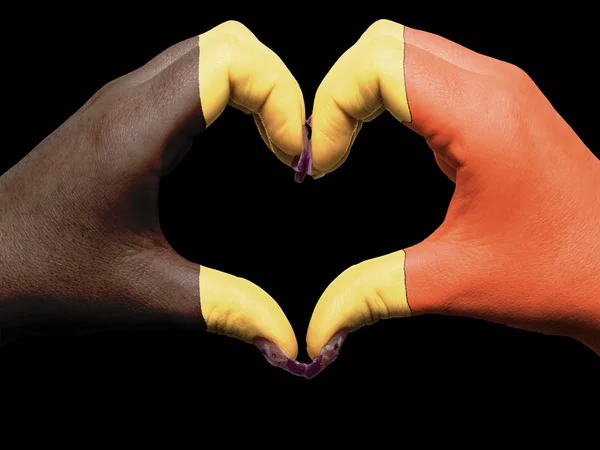 Heart and love gesture by hands colored in belgium flag for tour — Stock Photo, Image