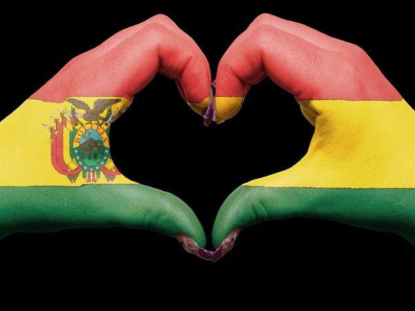 Herz und Liebe Geste von Händen in Bolivien Flagge gefärbt während f — Stockfoto