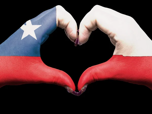 Жест любви и сердца руками, раскрашенными в чилийский флаг для туристов — стоковое фото
