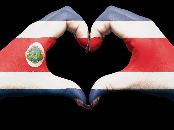 Coração e gesto de amor por mãos coloridas na bandeira da costa rica para t — Fotografia de Stock