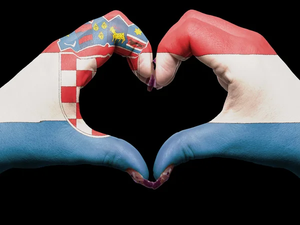 Heart and love gesture by hands colored in croatia flag for tour — Stock Photo, Image