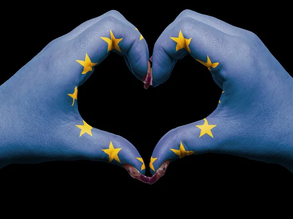 Heart and love gesture by hands colored in europe flag for touri — Stock Photo, Image