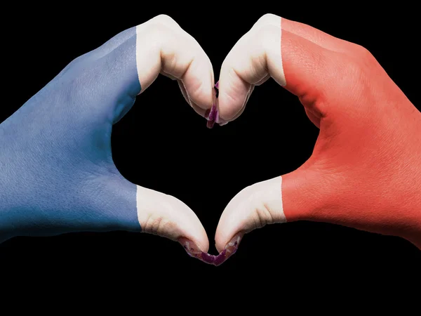 Corazón y el amor gesto por las manos de color en la bandera de Francia para touri — Foto de Stock