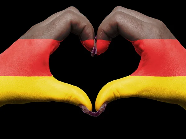 心と愛のジェスチャーの手ではツアーのためのドイツの旗の色 — ストック写真