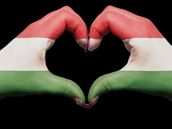 Heart and love gesture by hands colored in hungary flag for tour — Stock Photo, Image