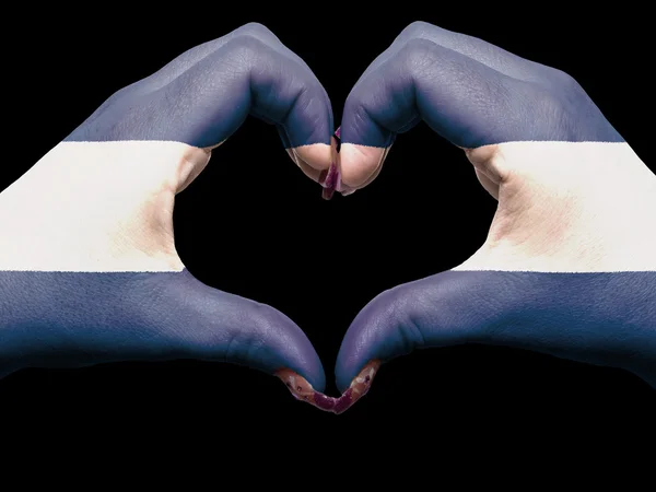 Cuore e amore gesto da mani colorate in bandiera nicaragua per — Foto Stock
