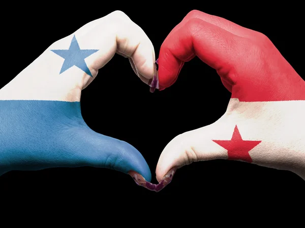 Geste de coeur et d'amour par les mains colorées dans le drapeau panama pour la tournée — Photo