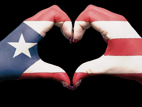 stock image Heart and love gesture by hands colored in puerto rico flag for