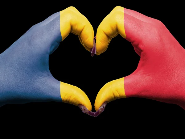 Corazón y gesto de amor con las manos coloreadas en bandera romania para la gira — Foto de Stock