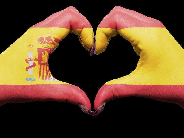 Hjärta och kärlek gest av händer färgade i Spanien flagga för touris — Stockfoto