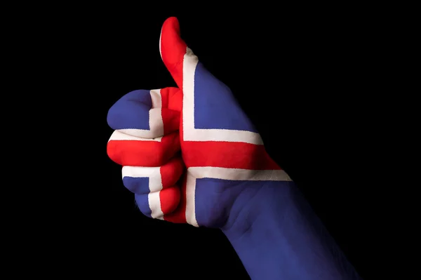 Государственный флаг Исландии поднял большой палец за выдающиеся достижения и ачиев — стоковое фото