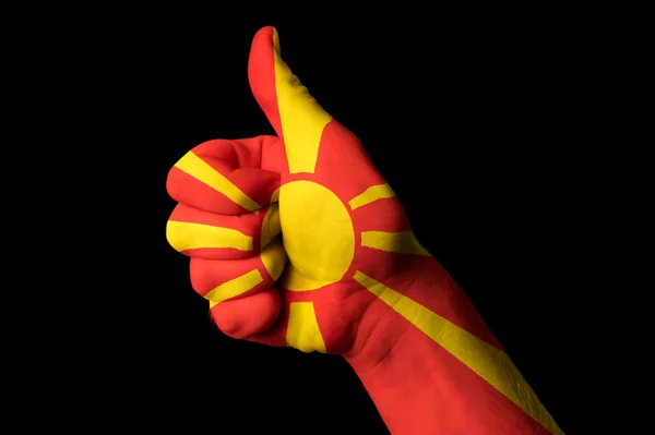 Národní vlajka Makedonie s prstem gesto pro dokonalost a h. — Stock fotografie