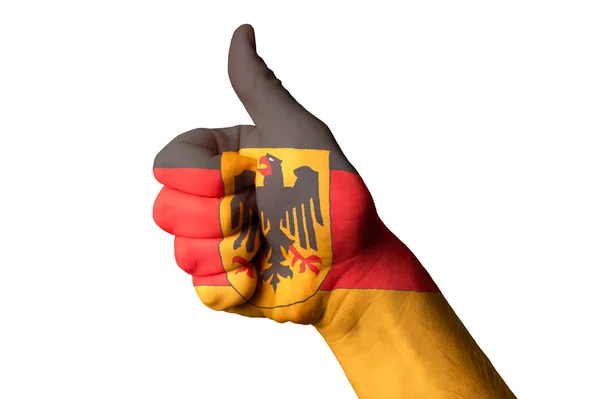 Германский национальный флаг поднял большой палец за выдающиеся достижения и ачиев — стоковое фото