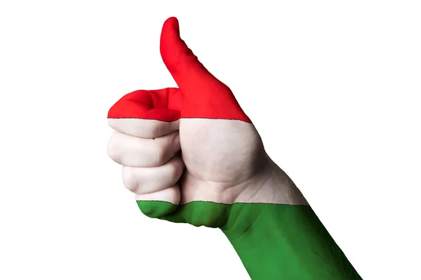 Magyar nemzeti zászló hüvelykujját, gesztus és elérésére láncba — Stock Fotó
