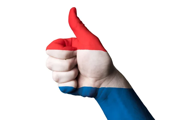Netherlands national flag thumb up gesture for excellence and ac — Stock Photo, Image