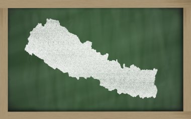 Outline map of nepal on blackboard