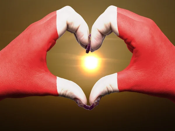 Srdce a lásku gesto rukou barevné v peru vlajky během beau — Stock fotografie