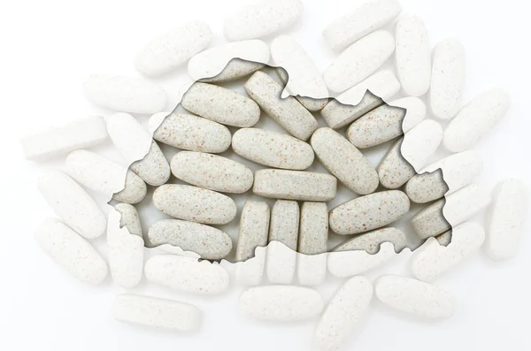 Карта Бутана с таблетками на заднем плане для здоровья и — стоковое фото