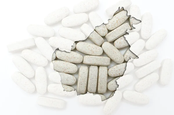 Overzicht van de selecteur van borneo met pillen op de achtergrond voor de gezondheid een — Stockfoto
