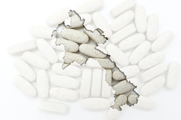 Outline map of laos with pills in the background for health and — Stock Photo, Image