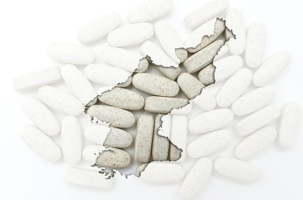 Карта Северной Кореи с таблетками на заднем плане для исцеления — стоковое фото