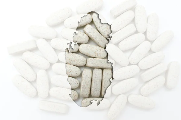 Outline map of qatar with pills in the background for health and — Stock Photo, Image