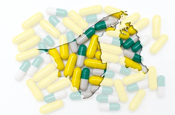 Outline map of brunei with pills in the background for health an — Stock Photo, Image