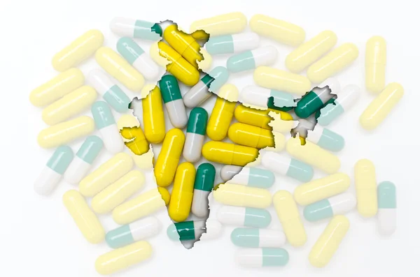Περίγραμμα της Ινδίας με χάπια στο παρασκήνιο για την υγεία και — Φωτογραφία Αρχείου
