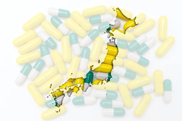 Mapa de Japón con pastillas en el fondo para la salud y — Foto de Stock