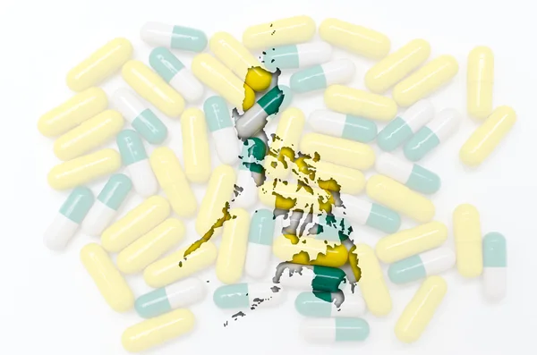 Aperçu carte de philippines avec des pilules en arrière-plan pour guérir — Photo