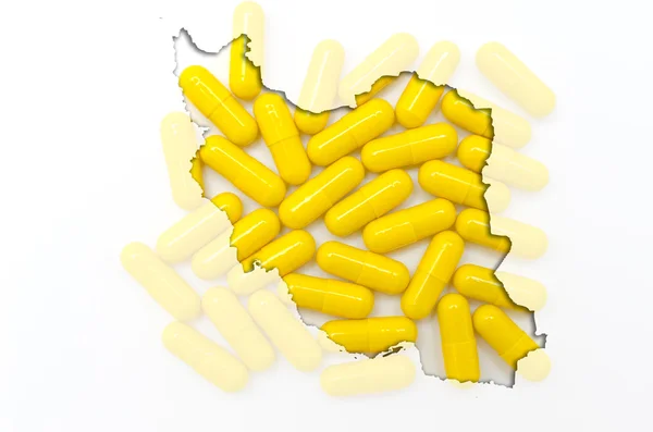 Overzicht-kaart van iran met pillen op de achtergrond voor gezondheid en — Stockfoto
