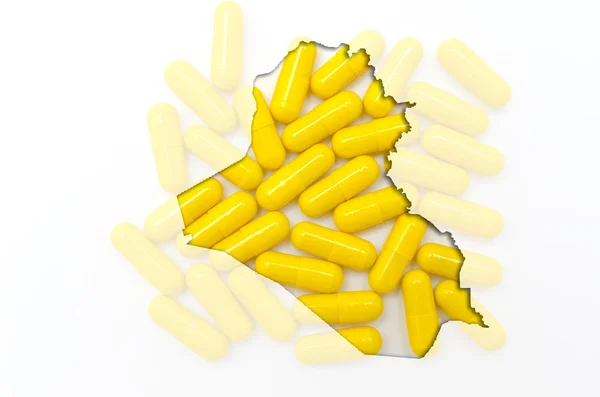 Outline map of iraq with pills in the background for health and — Stock Photo, Image