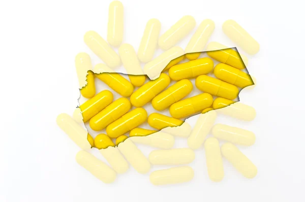 Карта єменів з таблетками на задньому плані для здоров'я і — стокове фото