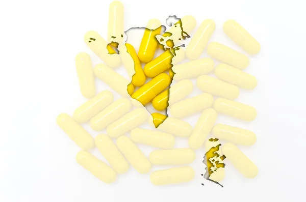 Outline map of bahrain with pills in the background for health a — Stock Photo, Image