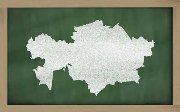 Outline map of kazakhstan on blackboard — Stock Photo, Image