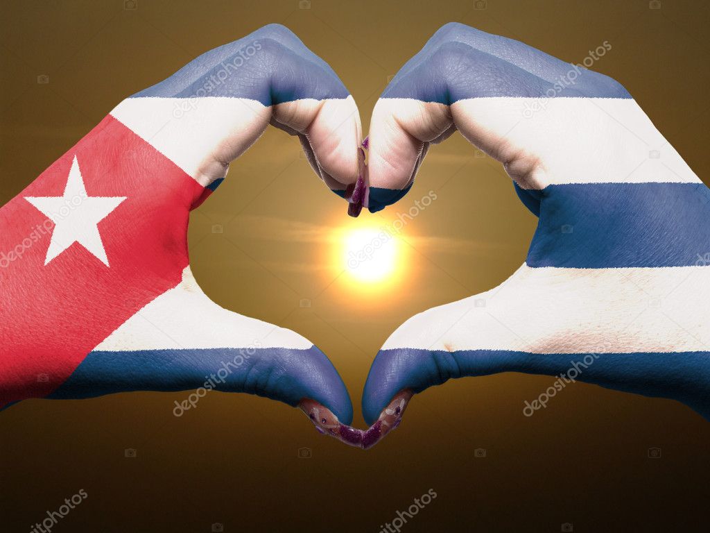 Heart and love gesture by hands colored in cuba flag during beau