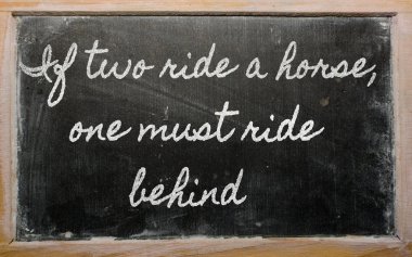 Expression - If two ride a horse, one must ride behind - writte clipart