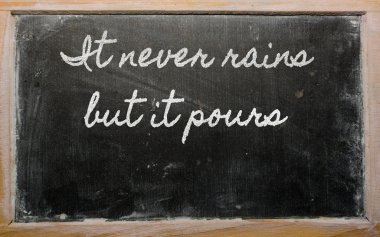 Expression - It never rains but it pours - written on a school clipart