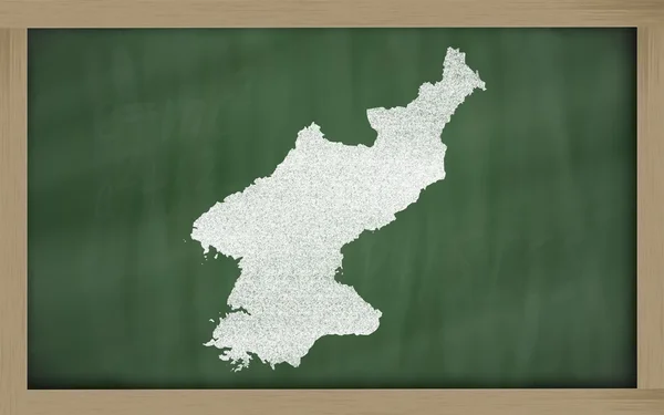 Outline map of north korea on blackboard — Stock Photo, Image