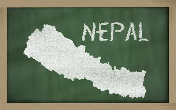 Outline map of nepal on blackboard — Stockfoto