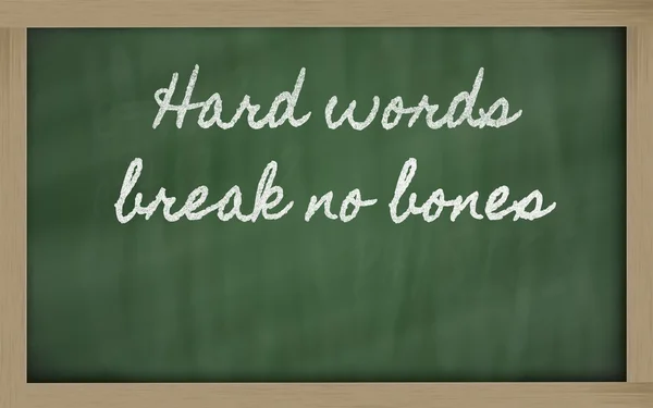 Expression - Hard words break no bones - written on a school bl — Stock Photo, Image